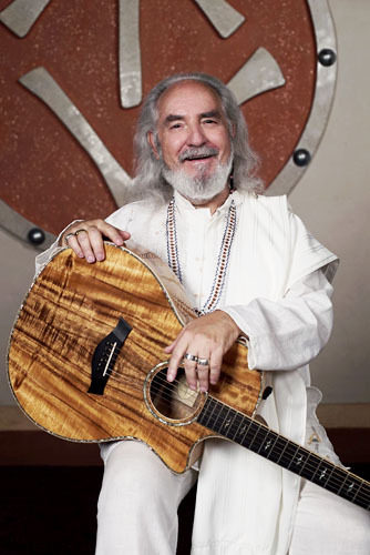 Van of Urantia smiling with guitar